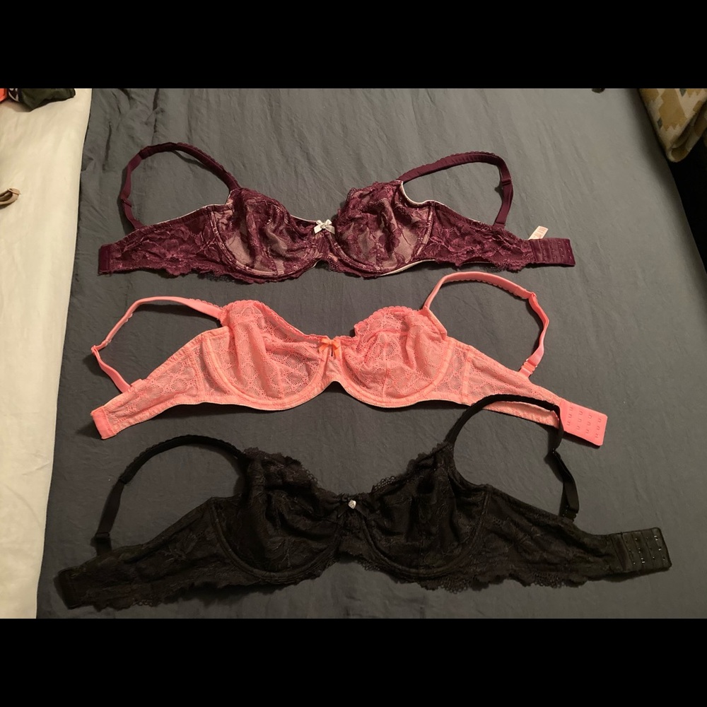 Three Victoria’s Secret bras. All three 34 DDD.